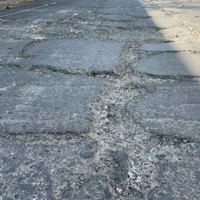 八道江路面起砂露石子修补料